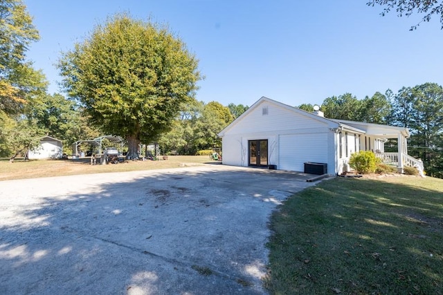 view of home's exterior with a lawn