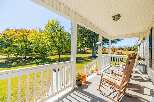 balcony featuring a porch