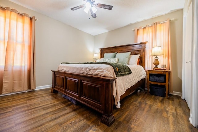 bedroom featuring ceiling fan and dark hardwood / wood-style flooring