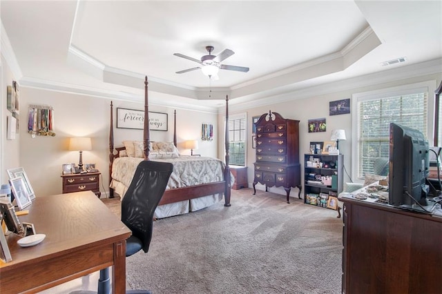 466 Sweet Apple Ln, Buford, GA 30518 - carpeted bedroom featuring a raised ceiling, multiple windows, ornamental molding, and ceiling fan