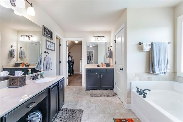 466 Sweet Apple Ln, Buford, GA 30518 - full bathroom featuring a garden tub, two vanities, and a spacious closet