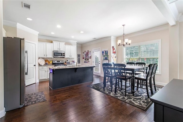 466 Sweet Apple Ln, Buford, GA 30518 - dining room featuring a chandelier, dark wood-style floors, recessed lighting, ornamental molding, and baseboards