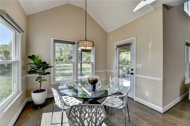 9440 Knollcrest Blvd, Alpharetta, GA 30022 - dining room featuring dark wood-type flooring, healthy amount of natural light, vaulted ceiling, and baseboards
