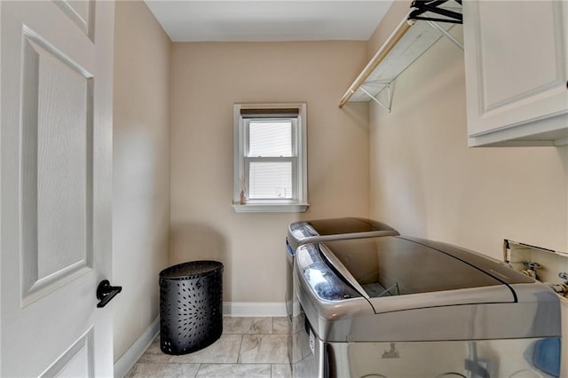 9440 Knollcrest Blvd, Alpharetta, GA 30022 - laundry area with cabinet space, baseboards, and separate washer and dryer
