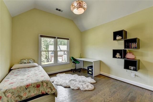9440 Knollcrest Blvd, Alpharetta, GA 30022 - bedroom with vaulted ceiling, wood finished floors, and baseboards