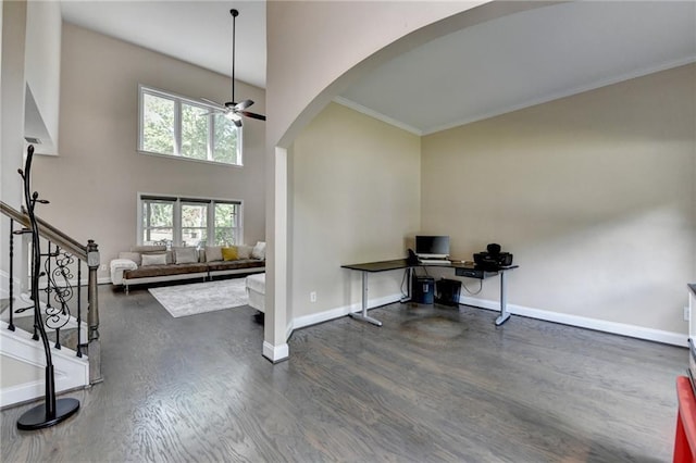 9440 Knollcrest Blvd, Alpharetta, GA 30022 - home office with arched walkways, ceiling fan, baseboards, wood finished floors, and ornamental molding