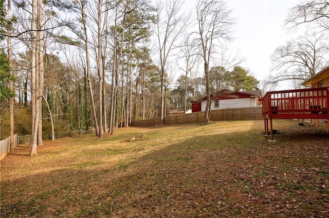 view of yard with a deck