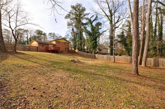 view of yard with a deck