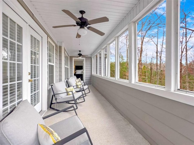 sunroom / solarium featuring plenty of natural light