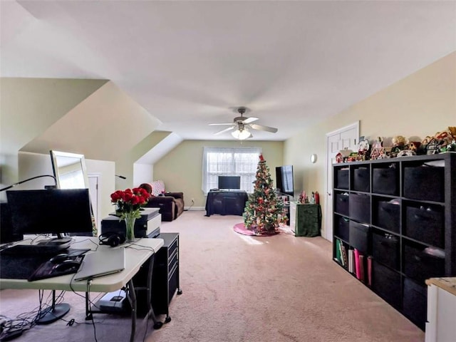 home office with a ceiling fan and carpet flooring