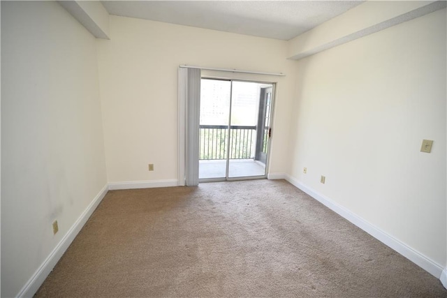 1075 Peachtree Walk NE Unit A519, Atlanta, GA 30309 - spare room featuring carpet floors and baseboards