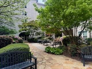 1075 Peachtree Walk NE Unit A519, Atlanta, GA 30309 - view of home's community with a patio area