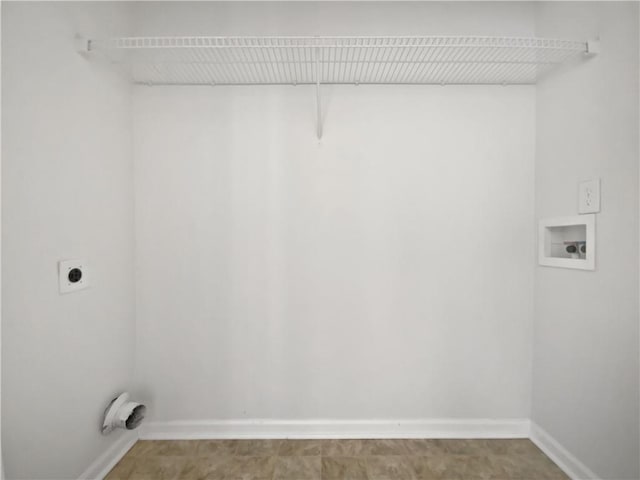 laundry room featuring baseboards, laundry area, hookup for a washing machine, and hookup for an electric dryer