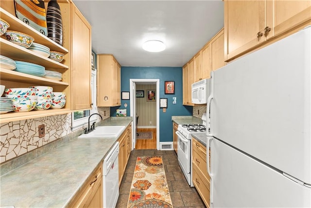 2511 Oak Ave, Tucker, GA 30084 - kitchen with white appliances, a sink, light brown cabinets, backsplash, and baseboards