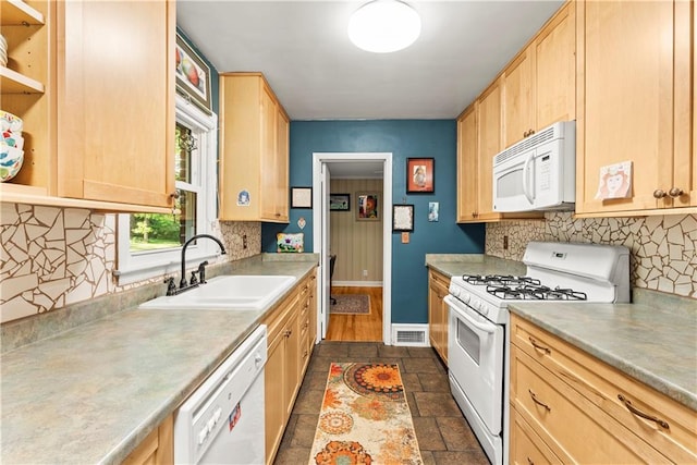 2511 Oak Ave, Tucker, GA 30084 - kitchen with white appliances, light brown cabinetry, decorative backsplash, and a sink