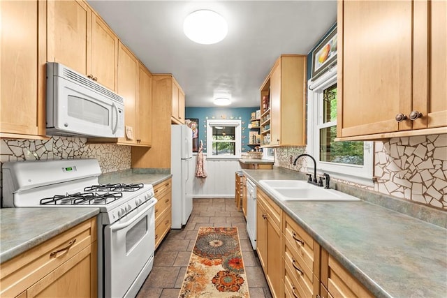 2511 Oak Ave, Tucker, GA 30084 - kitchen with white appliances, a sink, stone tile floors, light brown cabinetry, and backsplash