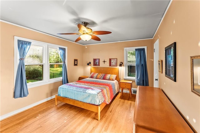 2511 Oak Ave, Tucker, GA 30084 - bedroom featuring light wood-style flooring, crown molding, baseboards, and ceiling fan
