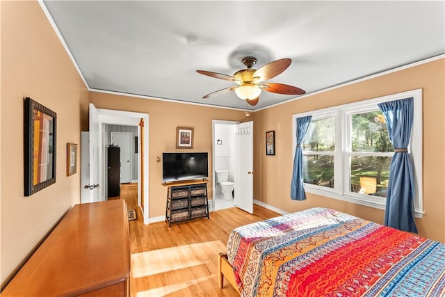 2511 Oak Ave, Tucker, GA 30084 - bedroom with light wood finished floors, ornamental molding, baseboards, a ceiling fan, and ensuite bath
