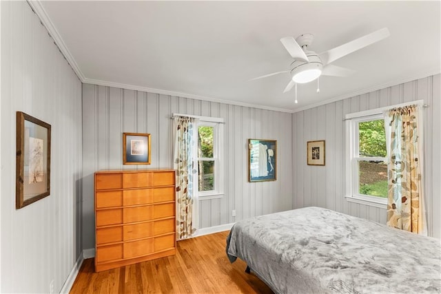 2511 Oak Ave, Tucker, GA 30084 - bedroom with crown molding, wood finished floors, baseboards, and a ceiling fan
