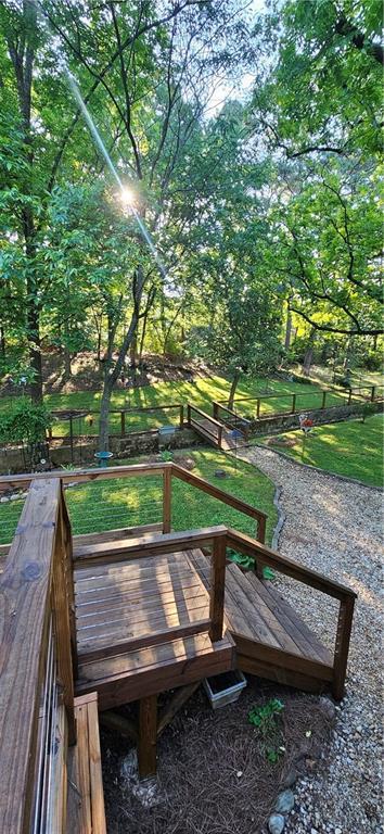 2511 Oak Ave, Tucker, GA 30084 - deck with a lawn and view of scattered trees