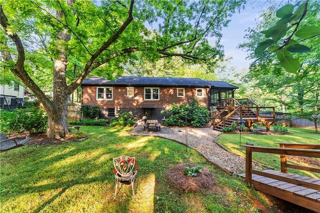 2511 Oak Ave, Tucker, GA 30084 - rear view of property featuring stairs, a wooden deck, a patio, and brick siding
