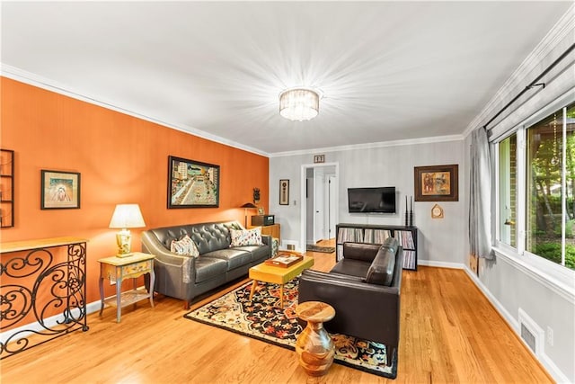 2511 Oak Ave, Tucker, GA 30084 - living area featuring ornamental molding, wood finished floors, a chandelier, and baseboards