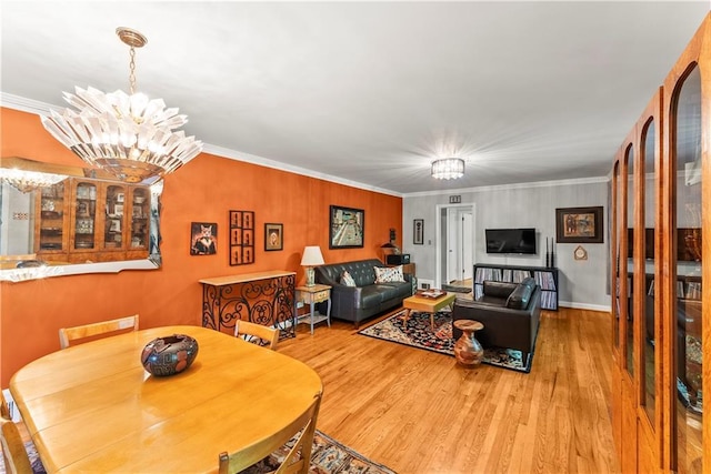 2511 Oak Ave, Tucker, GA 30084 - living area featuring a chandelier, wood finished floors, crown molding, and baseboards