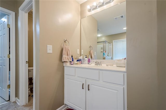13943 Sunfish Bnd, Alpharetta, GA 30004 - full bathroom with vanity, baseboards, and visible vents