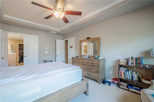 13943 Sunfish Bnd, Alpharetta, GA 30004 - carpeted bedroom featuring ornamental molding, a raised ceiling, ceiling fan, and washing machine and clothes dryer