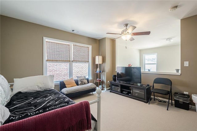 13943 Sunfish Bnd, Alpharetta, GA 30004 - living room with visible vents, carpet, ceiling fan, and baseboards