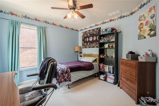 13943 Sunfish Bnd, Alpharetta, GA 30004 - bedroom with multiple windows, light carpet, ceiling fan, and visible vents