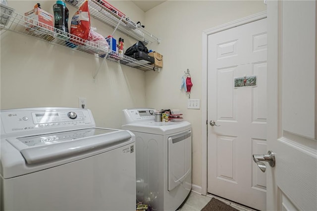 13943 Sunfish Bnd, Alpharetta, GA 30004 - laundry area with laundry area, independent washer and dryer, and light tile patterned floors