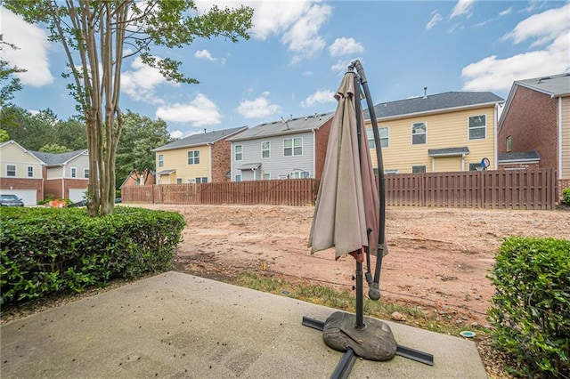 13943 Sunfish Bnd, Alpharetta, GA 30004 - exterior space with a residential view, fence, and a patio area