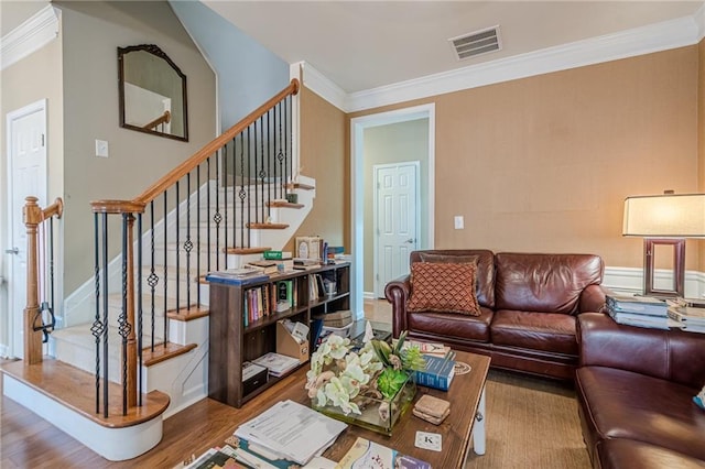 13943 Sunfish Bnd, Alpharetta, GA 30004 - living area featuring visible vents, ornamental molding, wood finished floors, and stairway