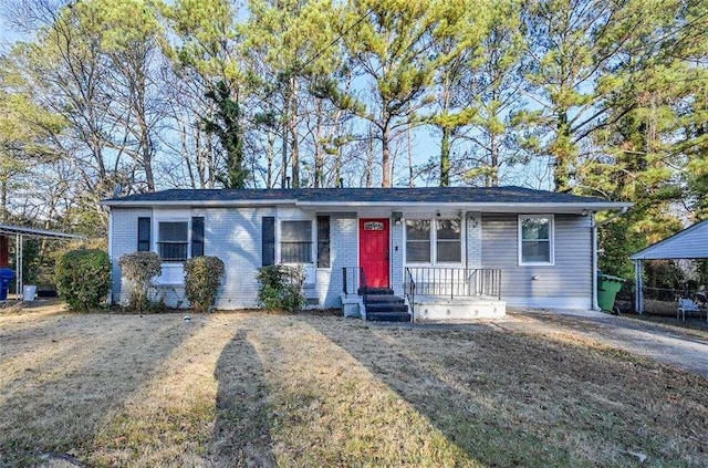 ranch-style home with a front yard