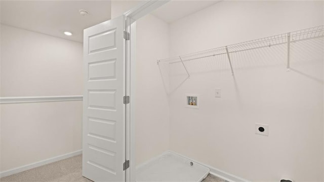 clothes washing area with laundry area, baseboards, hookup for a washing machine, carpet floors, and electric dryer hookup