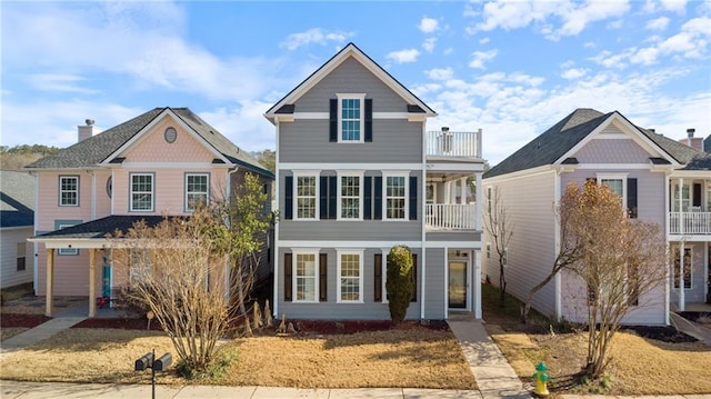 front of property with a balcony