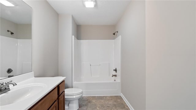 full bathroom with vanity, bathing tub / shower combination, and toilet