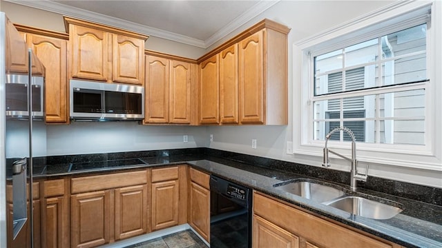 kitchen featuring dark stone countertops, sink, crown molding, and black appliances