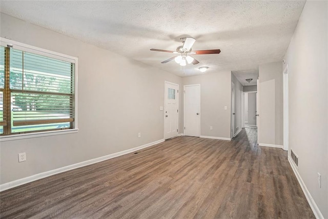 4442 Cedar Ridge Trl, Stone Mountain, GA 30083 - unfurnished room featuring wood finished floors, a textured ceiling, and a ceiling fan