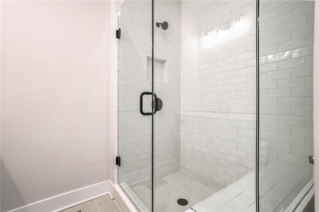 bathroom with an enclosed shower