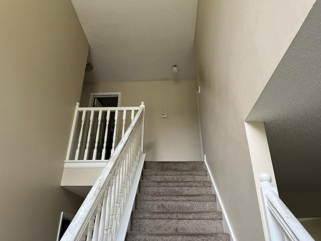 6157 Redtop Loop, Fairburn, GA 30213 - stairs featuring carpet flooring