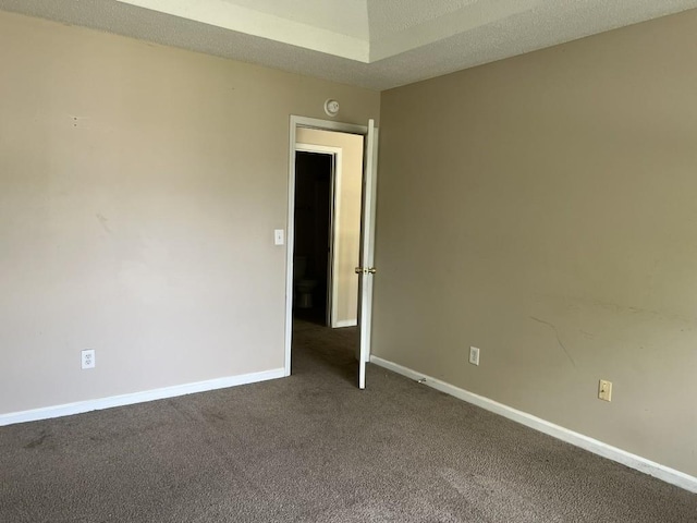 6157 Redtop Loop, Fairburn, GA 30213 - unfurnished room featuring dark colored carpet and baseboards