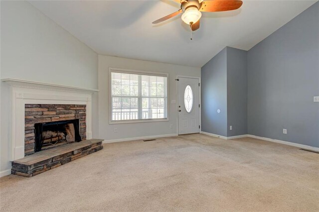 189 Meadow Spring Dr, Temple, GA 30179 - unfurnished living room with carpet flooring, ceiling fan, lofted ceiling, and baseboards
