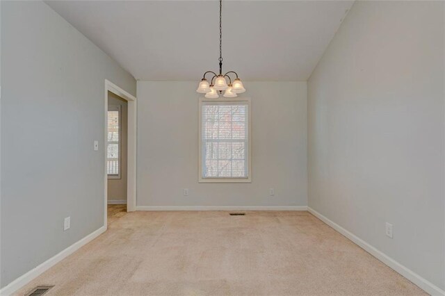 189 Meadow Spring Dr, Temple, GA 30179 - unfurnished room with a chandelier, light colored carpet, and baseboards