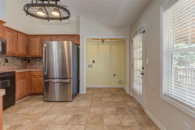 189 Meadow Spring Dr, Temple, GA 30179 - kitchen with stainless steel appliances, light countertops, and healthy amount of natural light