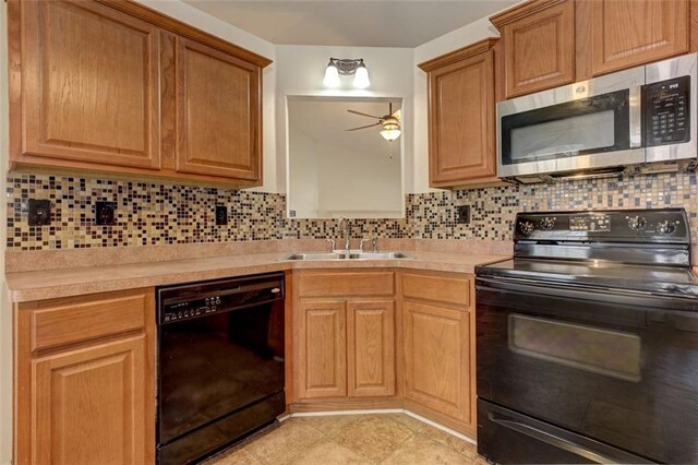 189 Meadow Spring Dr, Temple, GA 30179 - kitchen with black appliances, a sink, ceiling fan, light countertops, and tasteful backsplash