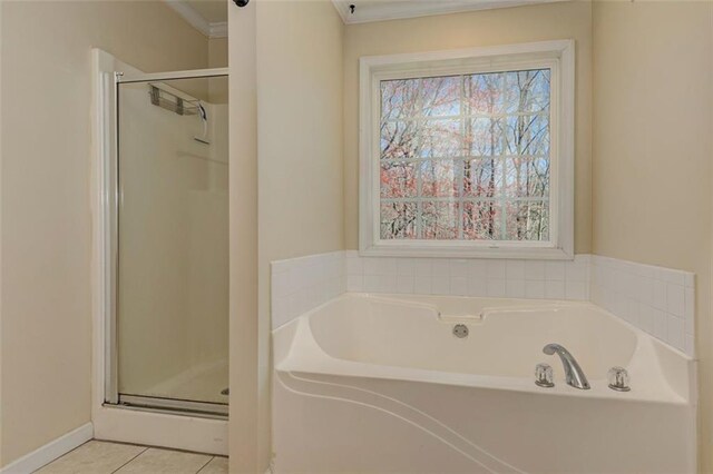 189 Meadow Spring Dr, Temple, GA 30179 - full bathroom featuring a stall shower, crown molding, a garden tub, and tile patterned floors