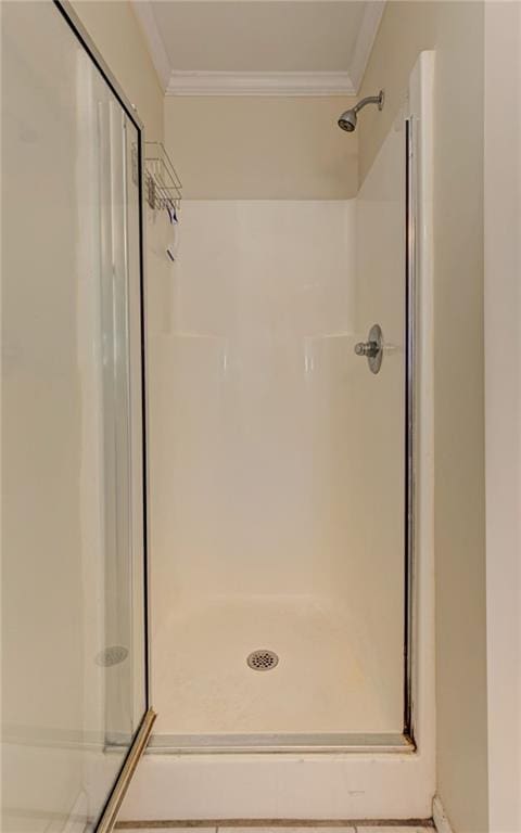 189 Meadow Spring Dr, Temple, GA 30179 - bathroom featuring crown molding and a stall shower