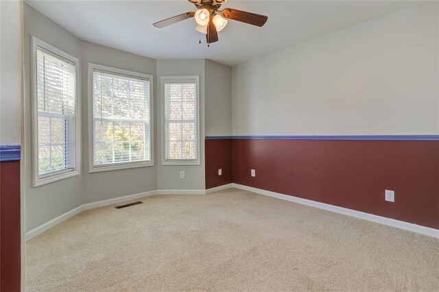 189 Meadow Spring Dr, Temple, GA 30179 - empty room with carpet flooring and plenty of natural light